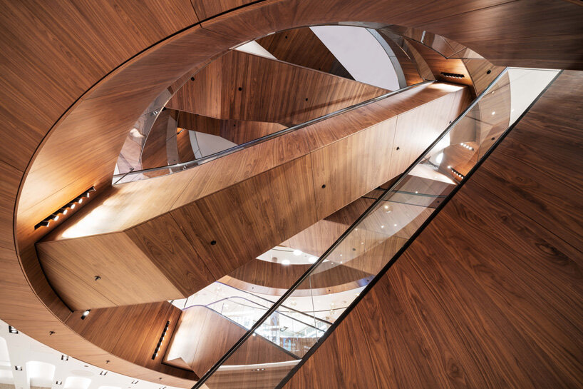 OMA's first quadrant of KaDeWe berlin masterplan opens, featuring wood-clad escalators