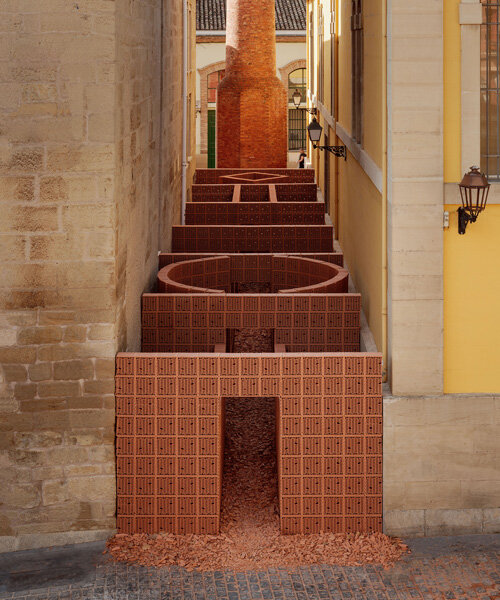 PALMA + HANGHAR insert temporary brick pavilion in old factory's narrow passage in spain