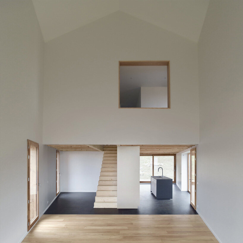 black corrugated metal clads récita architecture's slender house in rural france