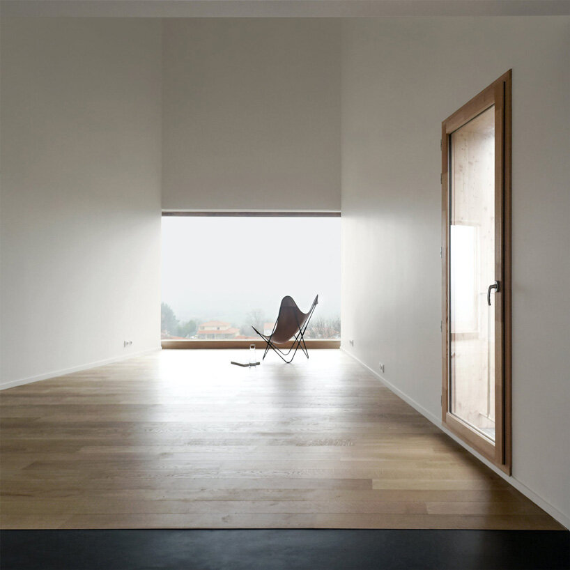 black corrugated metal clads récita architecture's slender house in rural france