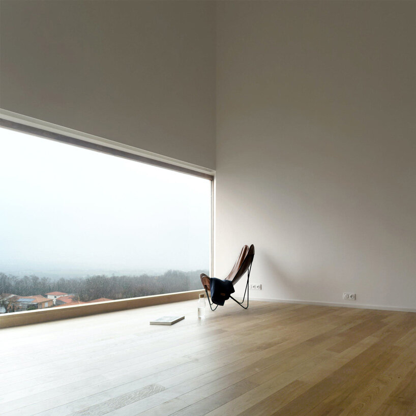 black corrugated metal clads récita architecture's slender house in rural france
