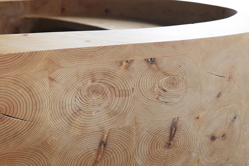 snøhetta inserts furniture inspired by a brush stroke inside tokyo co-working space