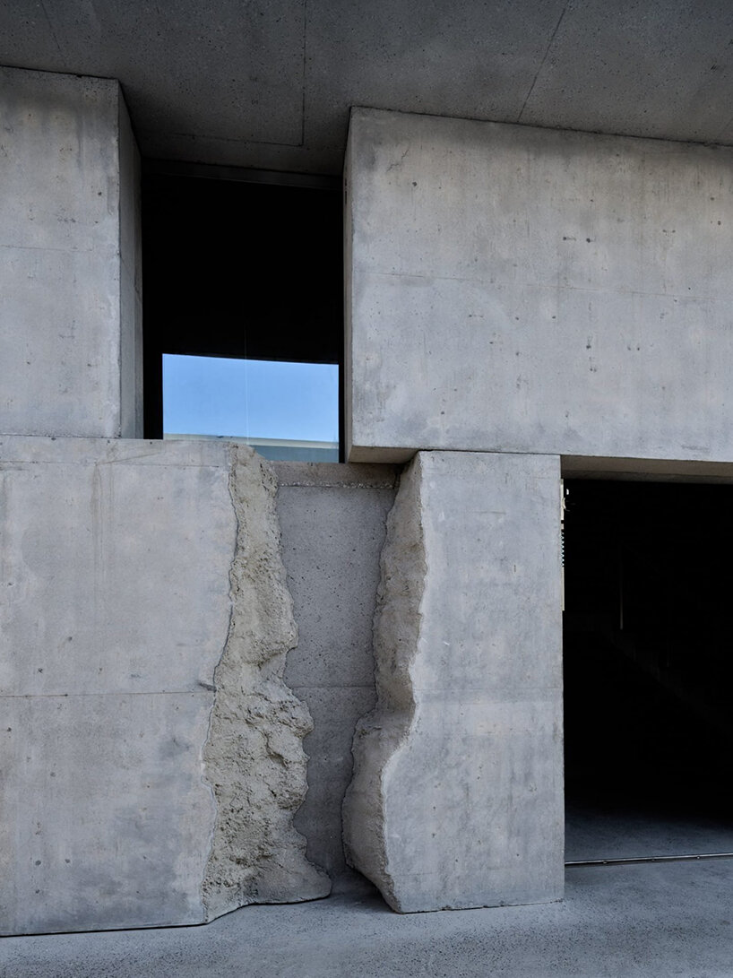 sand-casted concrete façade clads anne holtrop's green corner building in  bahrain