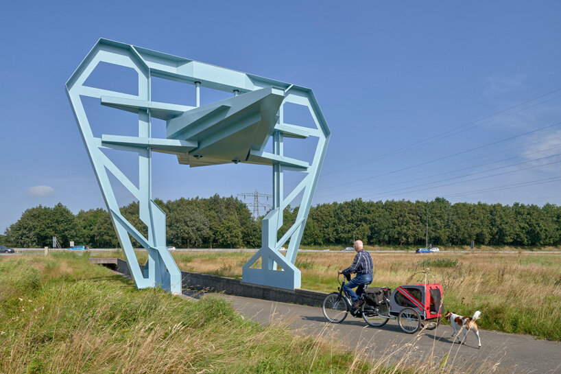 studio frank havermans erects a blue, industry inspired gate in the netherlands