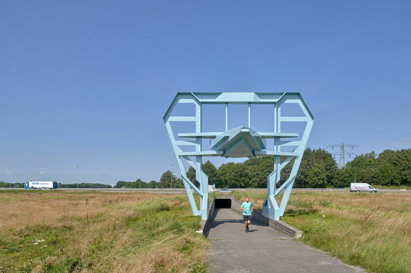 studio frank havermans erects a blue, industry inspired gate in the netherlands