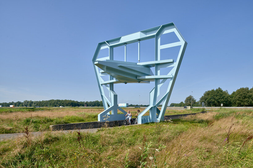 studio frank havermans erects a blue, industry inspired gate in the netherlands