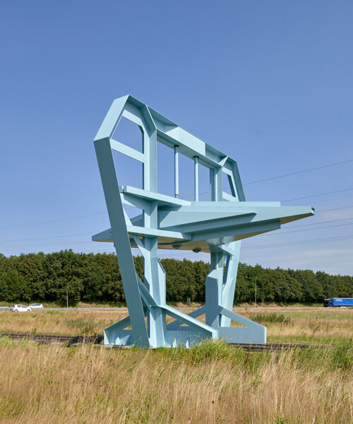 studio frank havermans erects a blue, industry inspired gate in the netherlands
