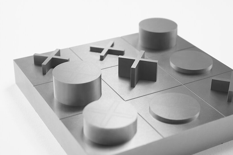 nendo's delicate tic tac toe board game turns into a sculptural piece at a finger's touch