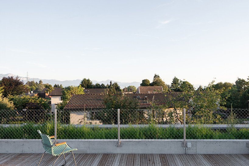 schauman & nordgren architects + meyer architecture build two-family villa in lausanne