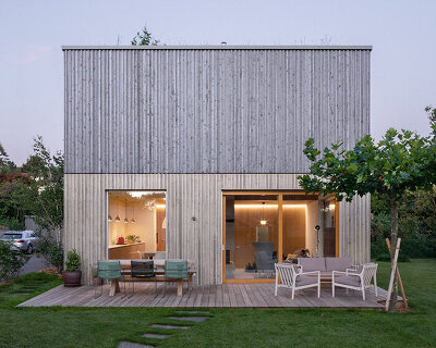 schauman & nordgren architects + meyer architecture build two-family villa in lausanne