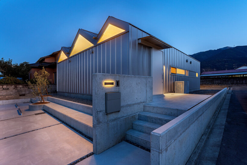 yusuke ando architects completes a 'house of six lightened ceilings' in japan