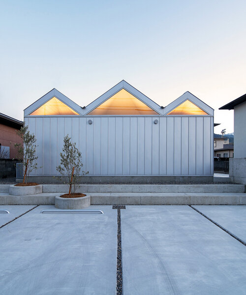 yusuke ando architects completes a 'house of six lightened ceilings' in japan