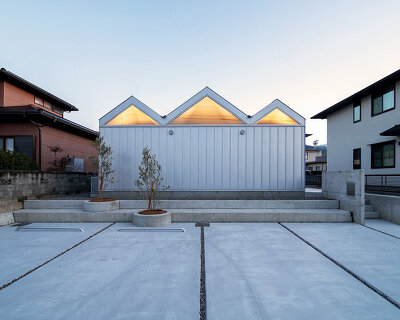 yusuke ando architects completes a 'house of six lightened ceilings' in japan