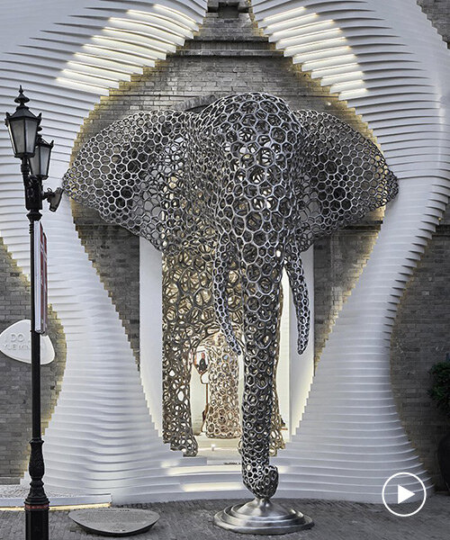 life-size lattice 3D-printed elephant pops out of antistatics' retail store façade in china