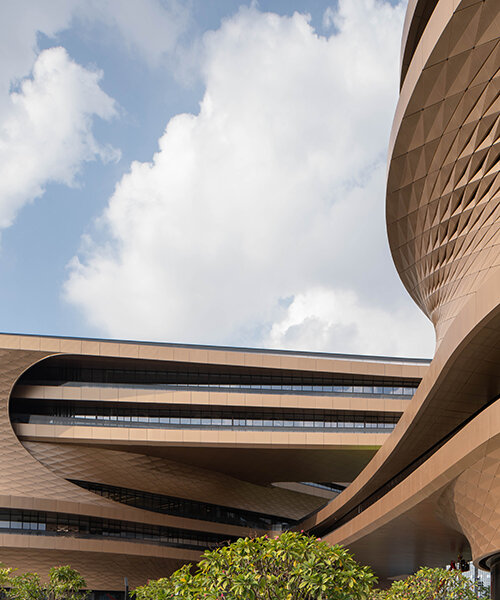 zaha hadid architects' fluid infinitus plaza takes shape as an infinity symbol