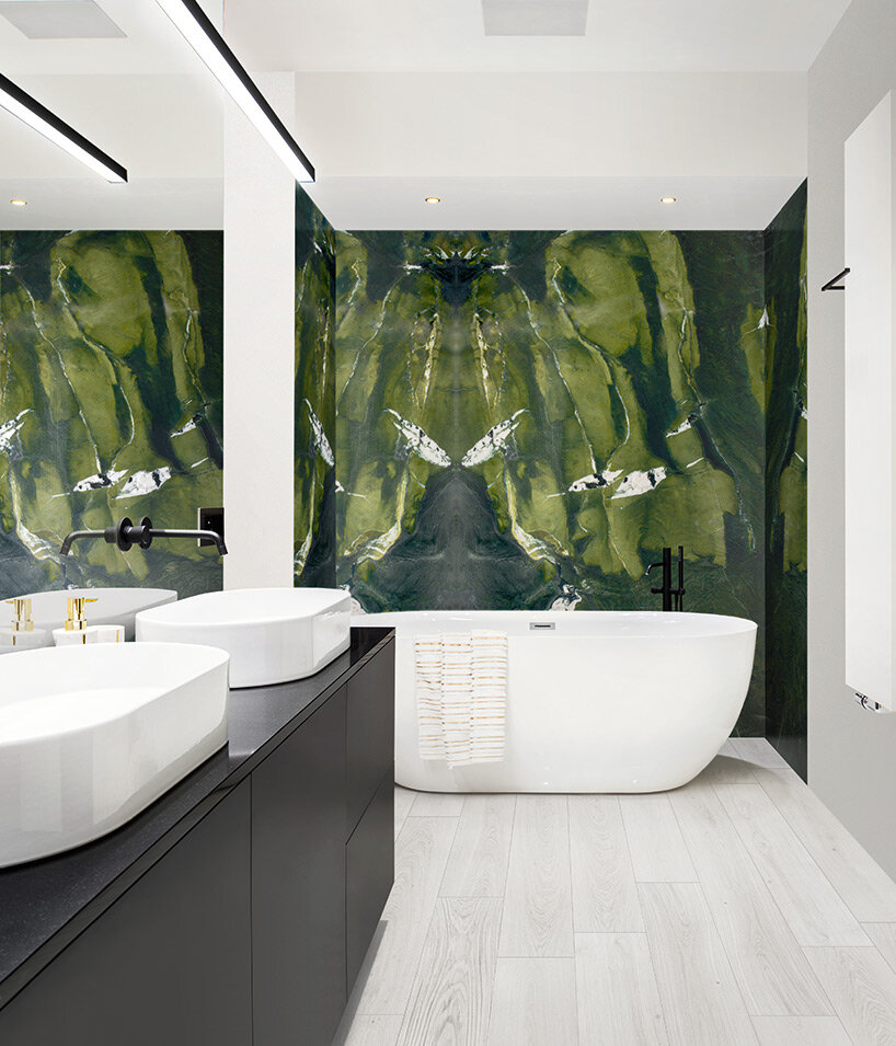 favorita spa decorates the interiors with 350 precious stone surfaces