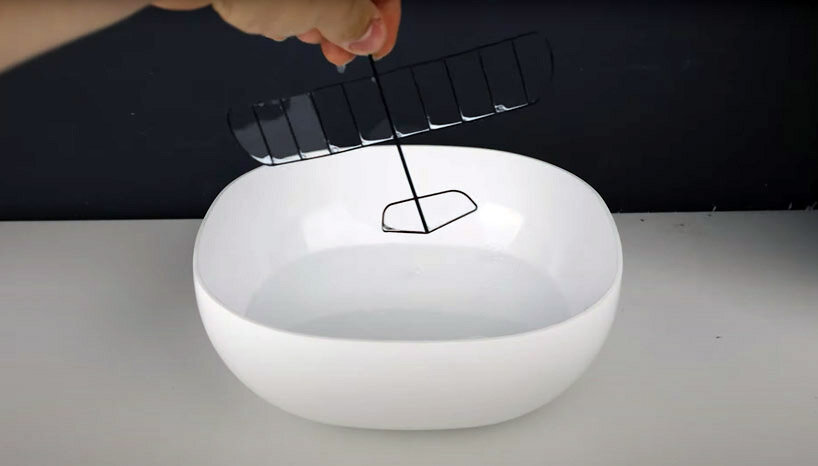 watch this ultralight glider with water wings take off