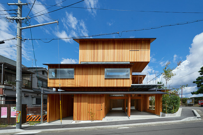 tomohiro hata shapes house in shimogamo, japan, as an arrangement of overlapping roofs