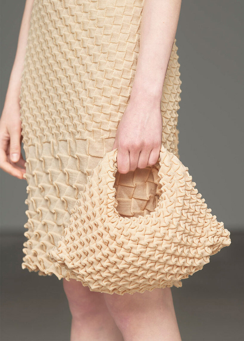 issey miyake's wool shell knit swirls like a seashell