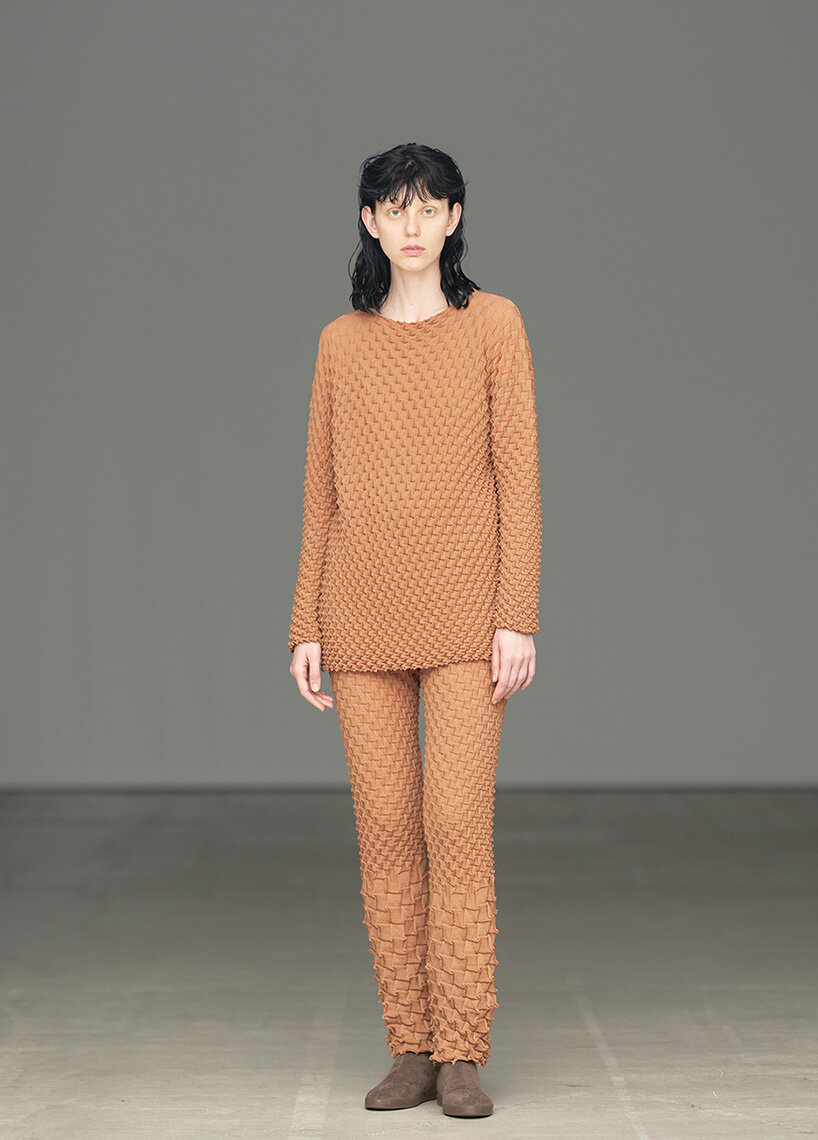 issey miyake's wool shell knit swirls like a seashell