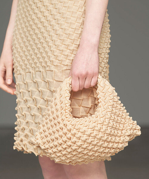 issey miyake's wool shell knit swirls like a seashell