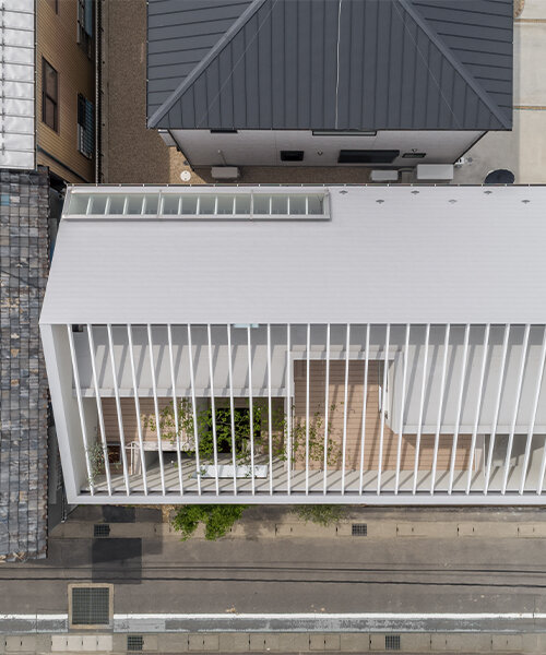 keitaro muto architects completes japanese house with partially-exposed roof