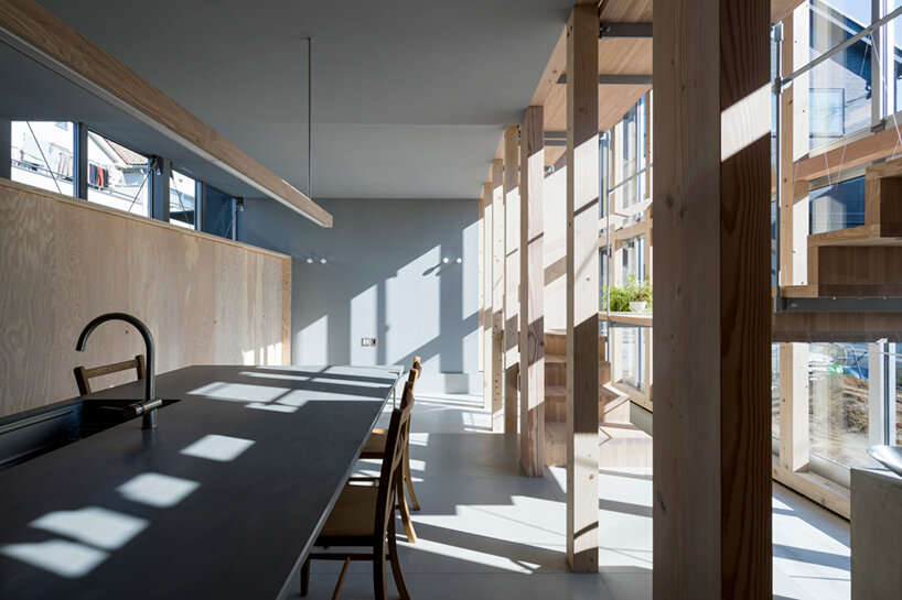 KIRI architects opens up this compact japanese house with a light-filled stair hall