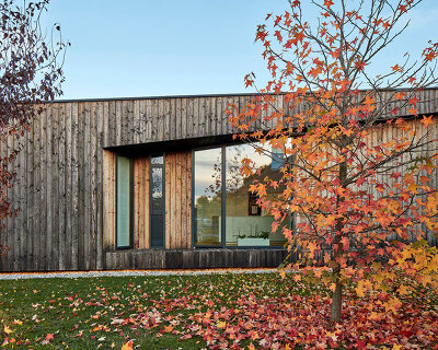 luca poian forms' simoni house is a folded timber box in northern italy