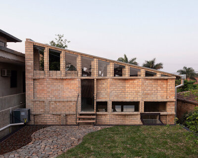 mínimo común arquitectura wraps its nordeste workspace with experimental brickwork
