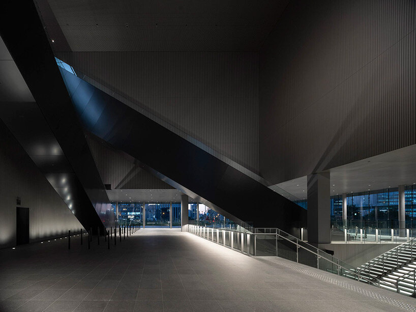 katsuhiko endo architect & associates carves a museum in osaka from a completely black volume