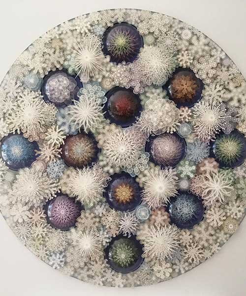rogan brown intricately cuts-out paper coral garden capturing nature's fragility