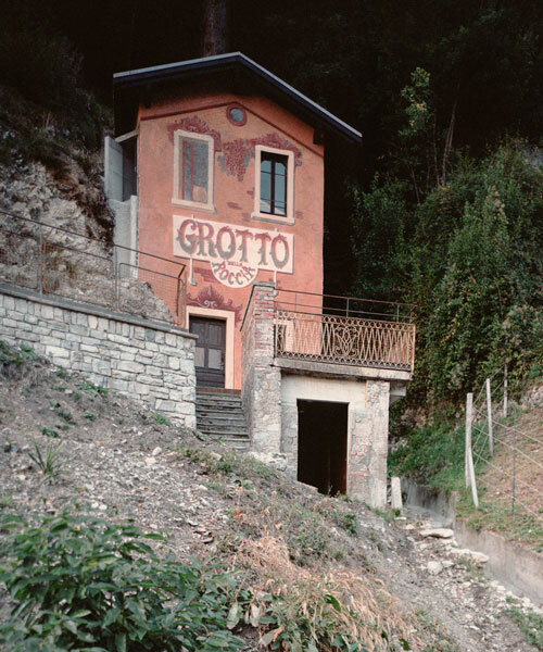 enrico sassi revives the ruinous grotto della roccia, embedded into the cliffs of switzerland