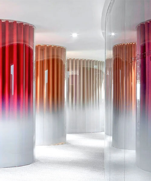 a series of glazed 'bubbles' breaks the monotony within a typical office fit-out in beijing