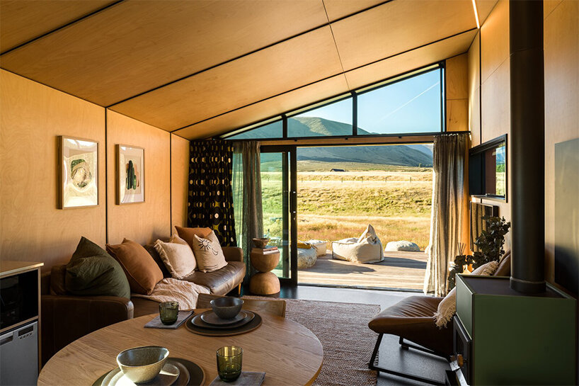 barry connor design's 50sqm cabin retreat in new zealand echoes the aerial dance of birds