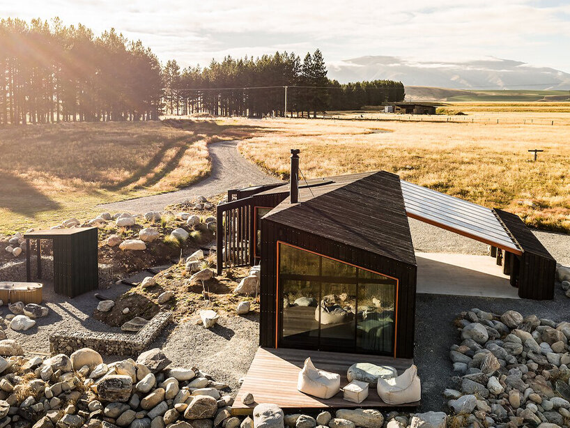 barry connor design's 50sqm cabin retreat in new zealand echoes the aerial dance of birds