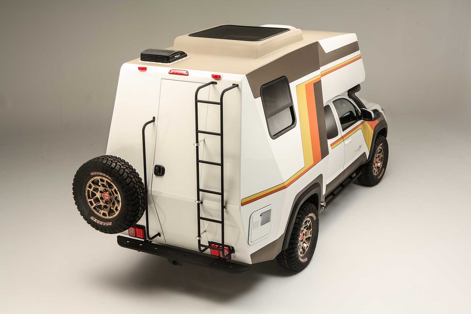 toyota hilux gets upgraded as 4WD camper with queen-sized bed and pull-out  breakfast bar