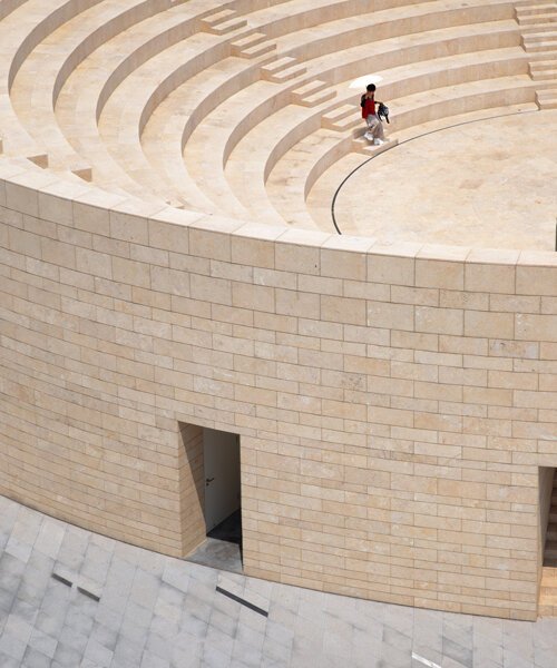 trace architecture office's aranya amphitheater overlooks coastline of china