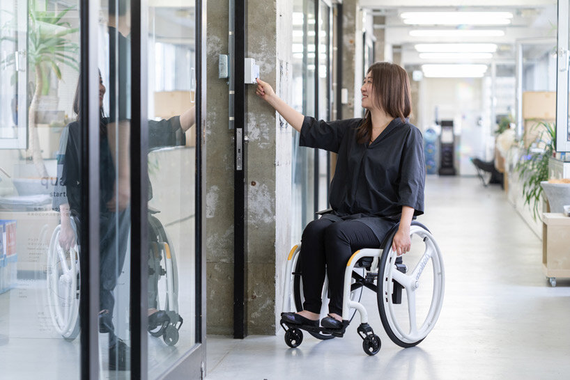 the wheeliy foldable wheelchair features yellow accents for intuitive handling