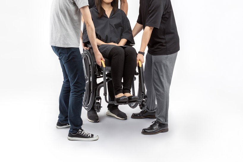 the wheeliy foldable wheelchair features yellow accents for intuitive handling