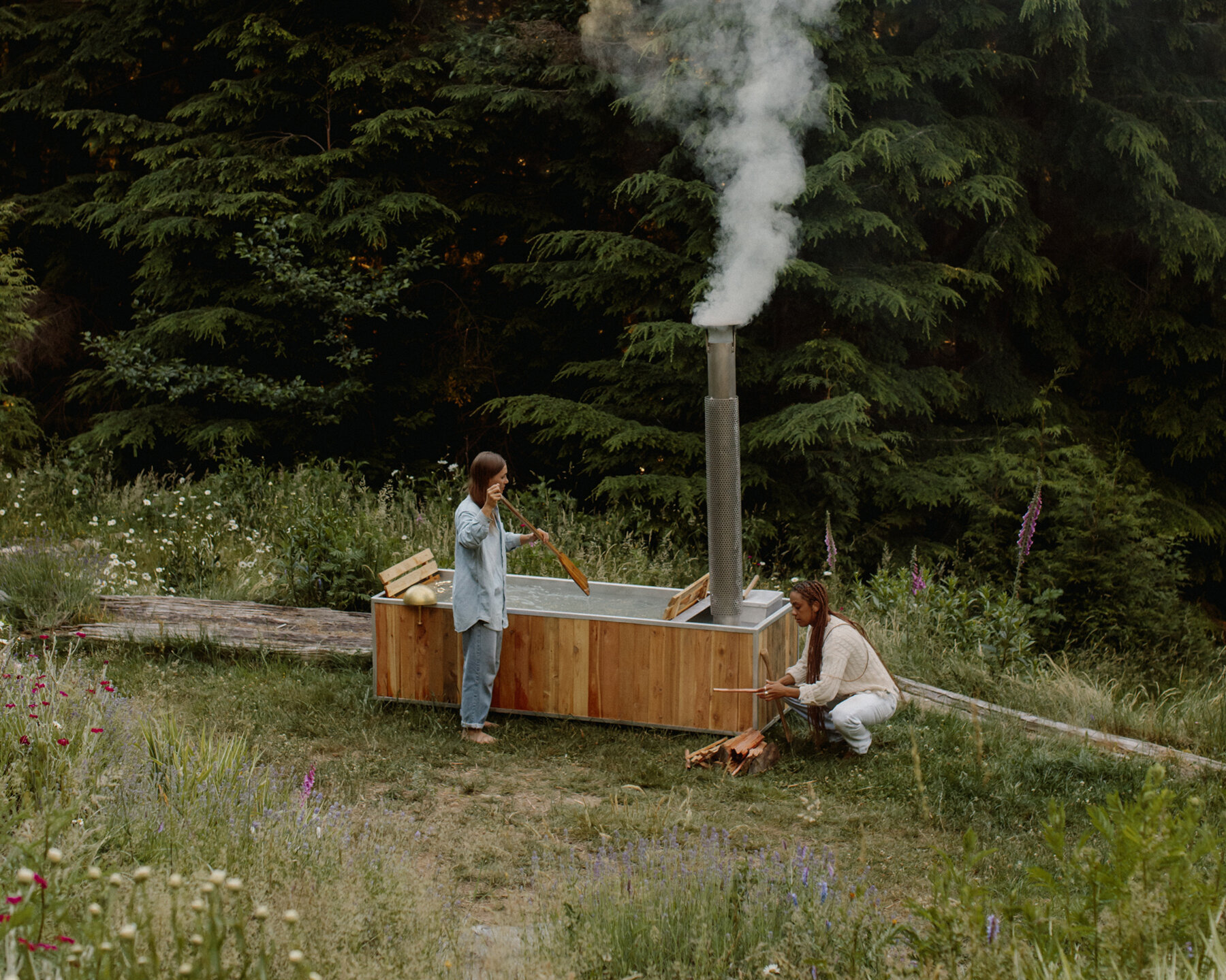 this wood-burning hot tub by goodland celebrates the experience nature