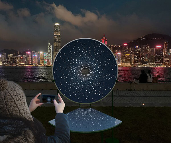 studio etain ho designs 'cone of radiance' light installation to bring joy & comfort to hong kong