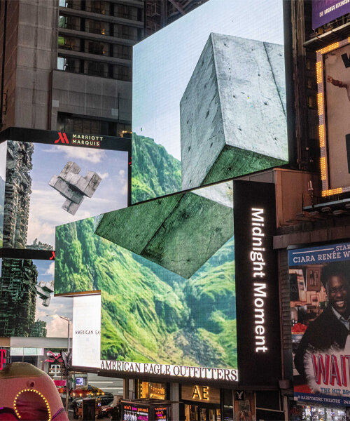 playing at times square, 'drifters' reveals concrete blocks floating across surreal highlands