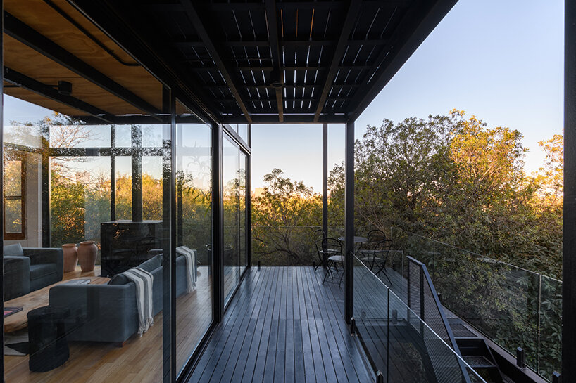 SET ideas revives stone dwelling with metal framework 'fluid house' intervention