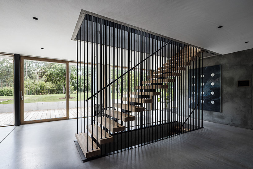 geometric residence by avanto architects wraps around sheltered courtyard in helsinki