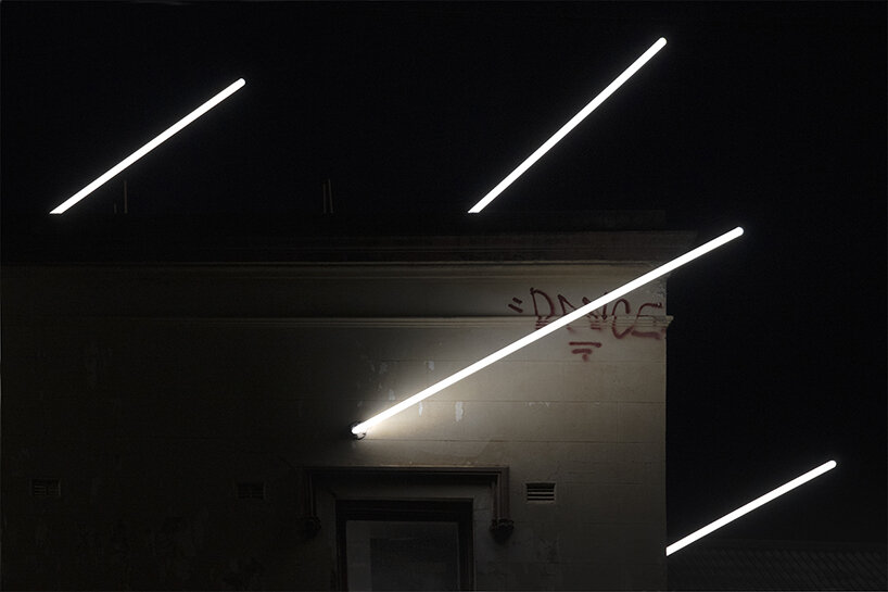 beams of light pierce through this 19th-century derelict building in sydney, australia