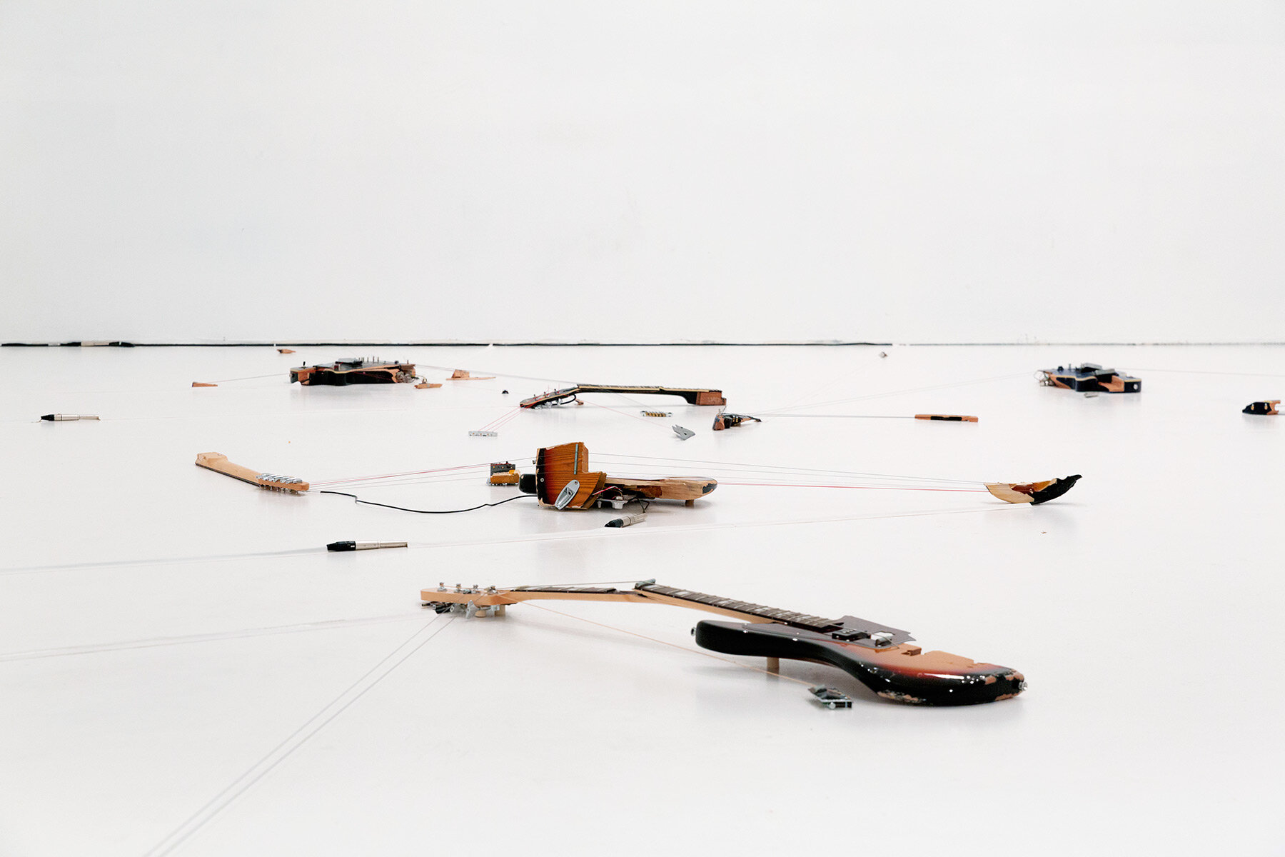 naama tsabar's broken guitars & sound holes transform miami art museum ...