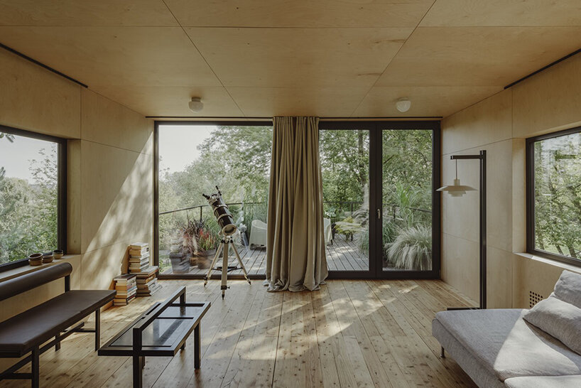 adam wiercinski joins two shipping containers to build snug home in poland