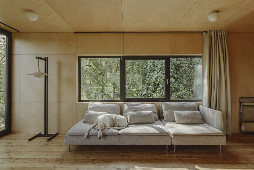 adam wiercinski joins two shipping containers to build snug home in poland