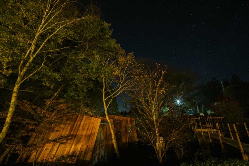 escape the city with SANU's timber cabins scattered in rural sites across japan