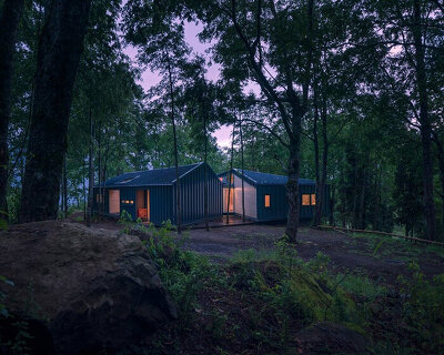 triangular introduces its corrugated steel-clad forest house in patagonia